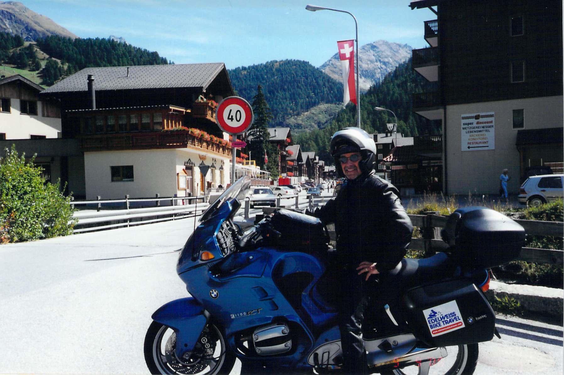 Jim riding through the Alps with Paula