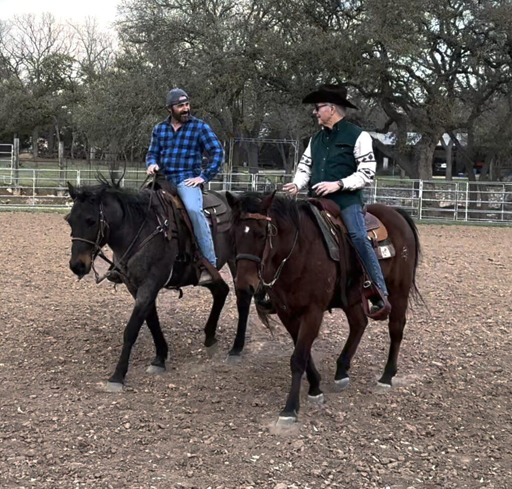 Jim Cathcart on horseback