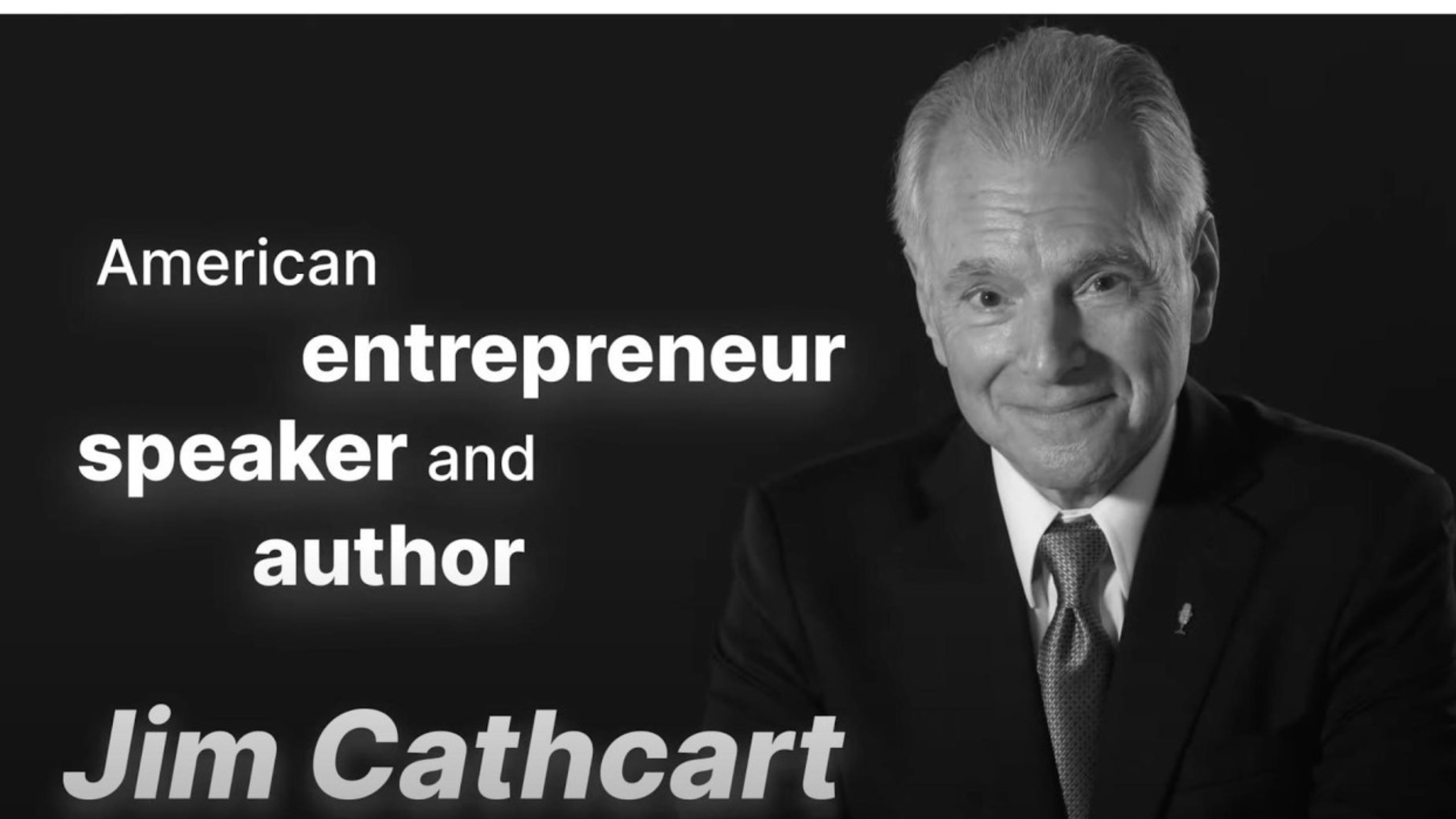 Jim Cathcart on stage with microphone