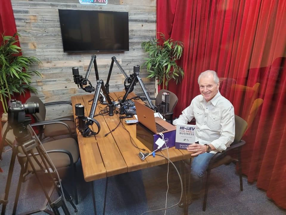Jim Cathcart in the podcast studio with microphones